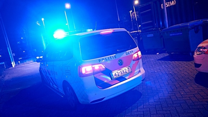 Politieauto zwaailicht nacht