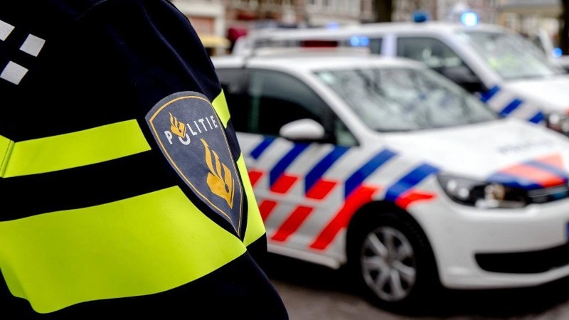 Politiejas en politieauto